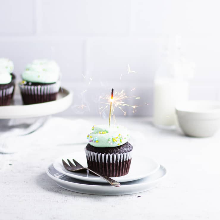 close up of mint chocolate cupcake with a sparkler
