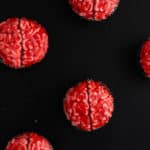 bleeding brain cupcakes against a black backdrop