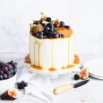 sweet potato cake topped with figs, blackberries and grapes