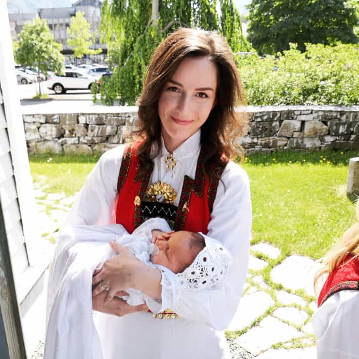 woman wearing a traditional Norwegian outfit known as a bunad