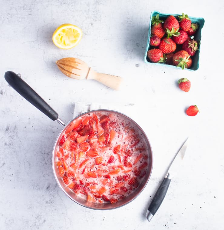 coarsely chopped strawberries in a pot