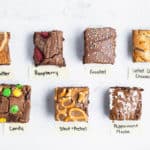 overhead photo of various kinds of brownies with labels