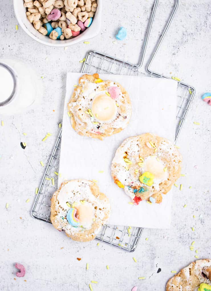 lucky charms cereal cookies on a cooling rack