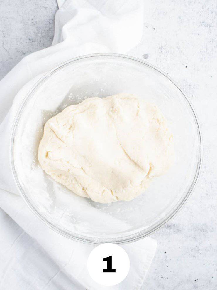 raw lefse dough in a clear bowl.